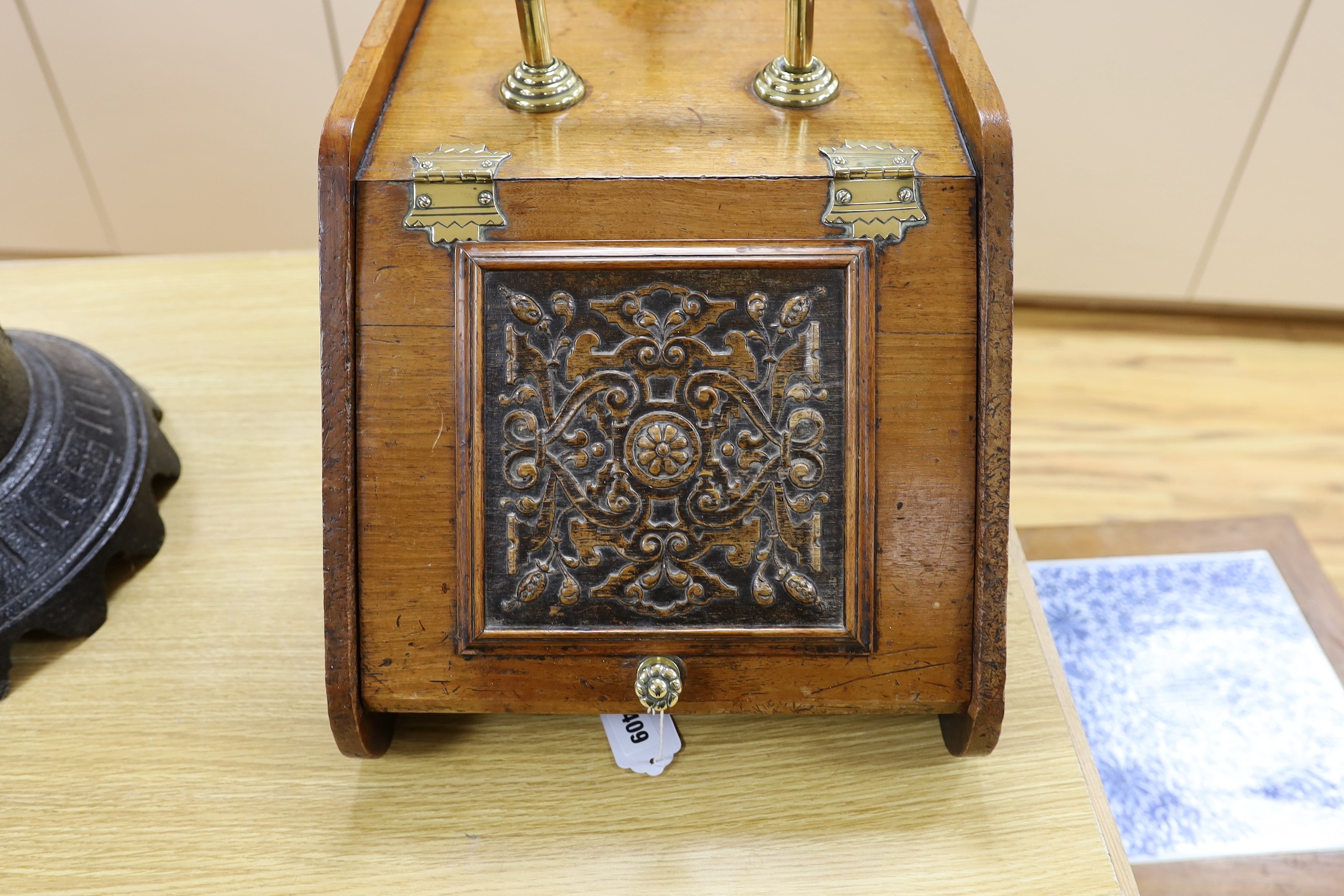 An Edwardian walnut brass handled and hinged perdonium, 28cms high x 45cms deep
